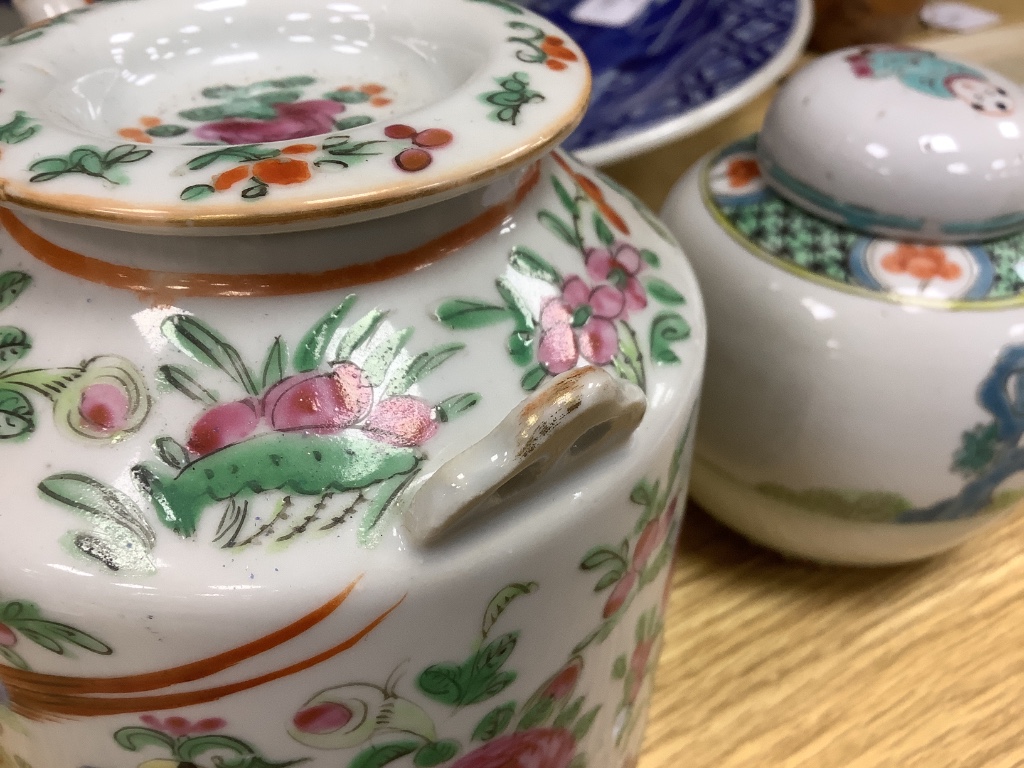 A Chinese famille rose tea pot and a similar jar and cover, tallest 14cm